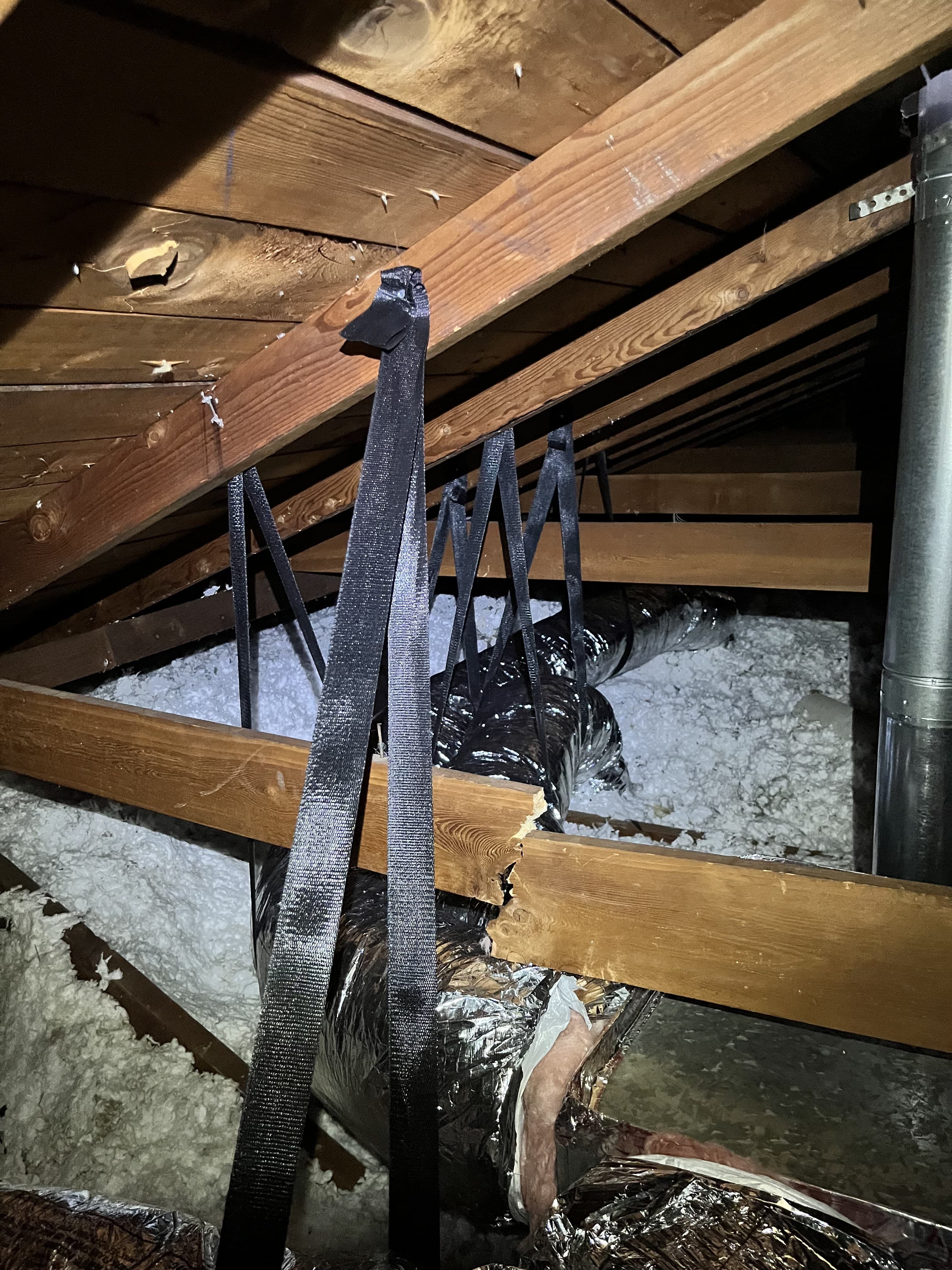Properly strapped attic ductwork installation