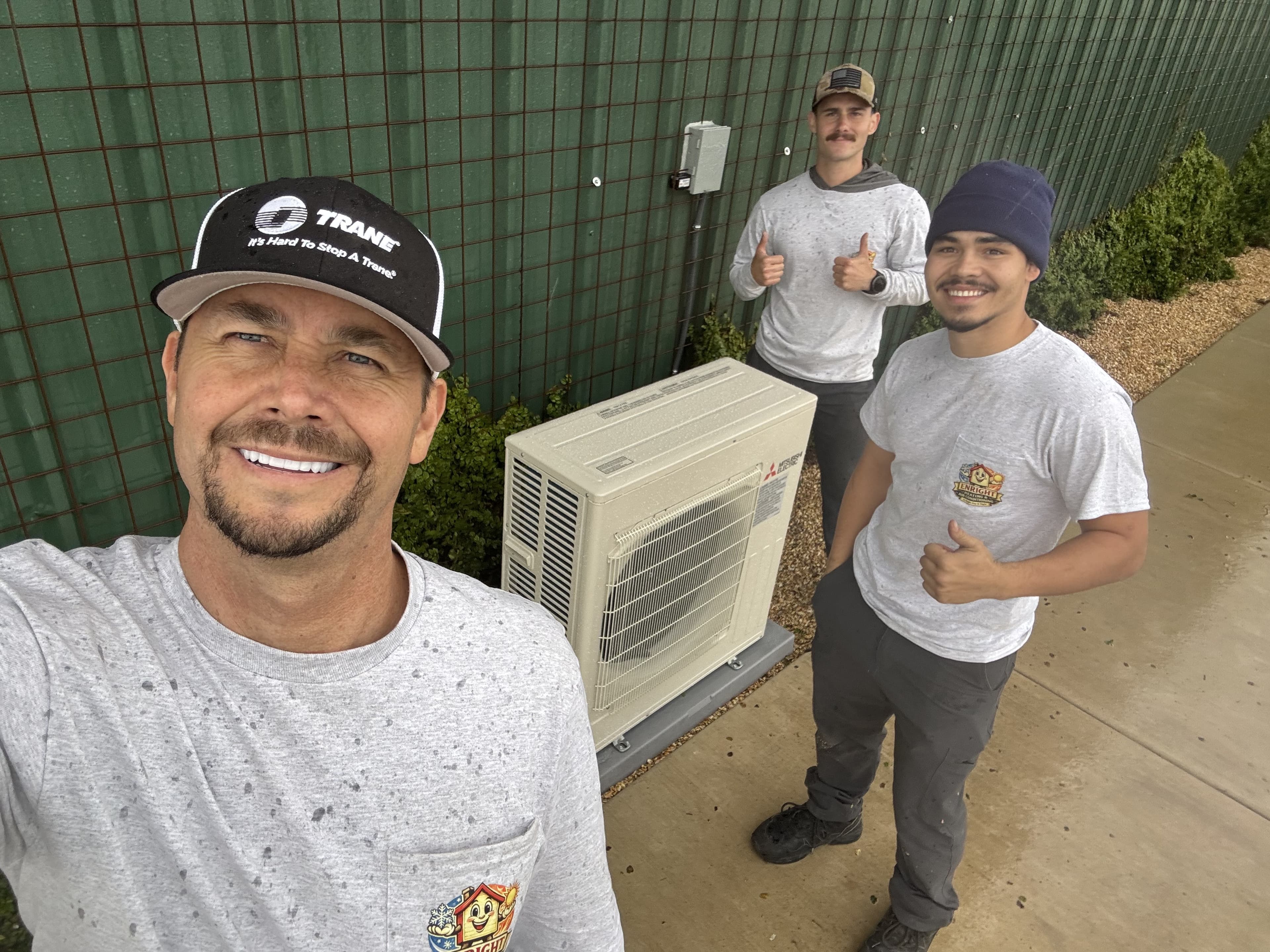 The Enright Heating & Air Conditioning team on an installation job
