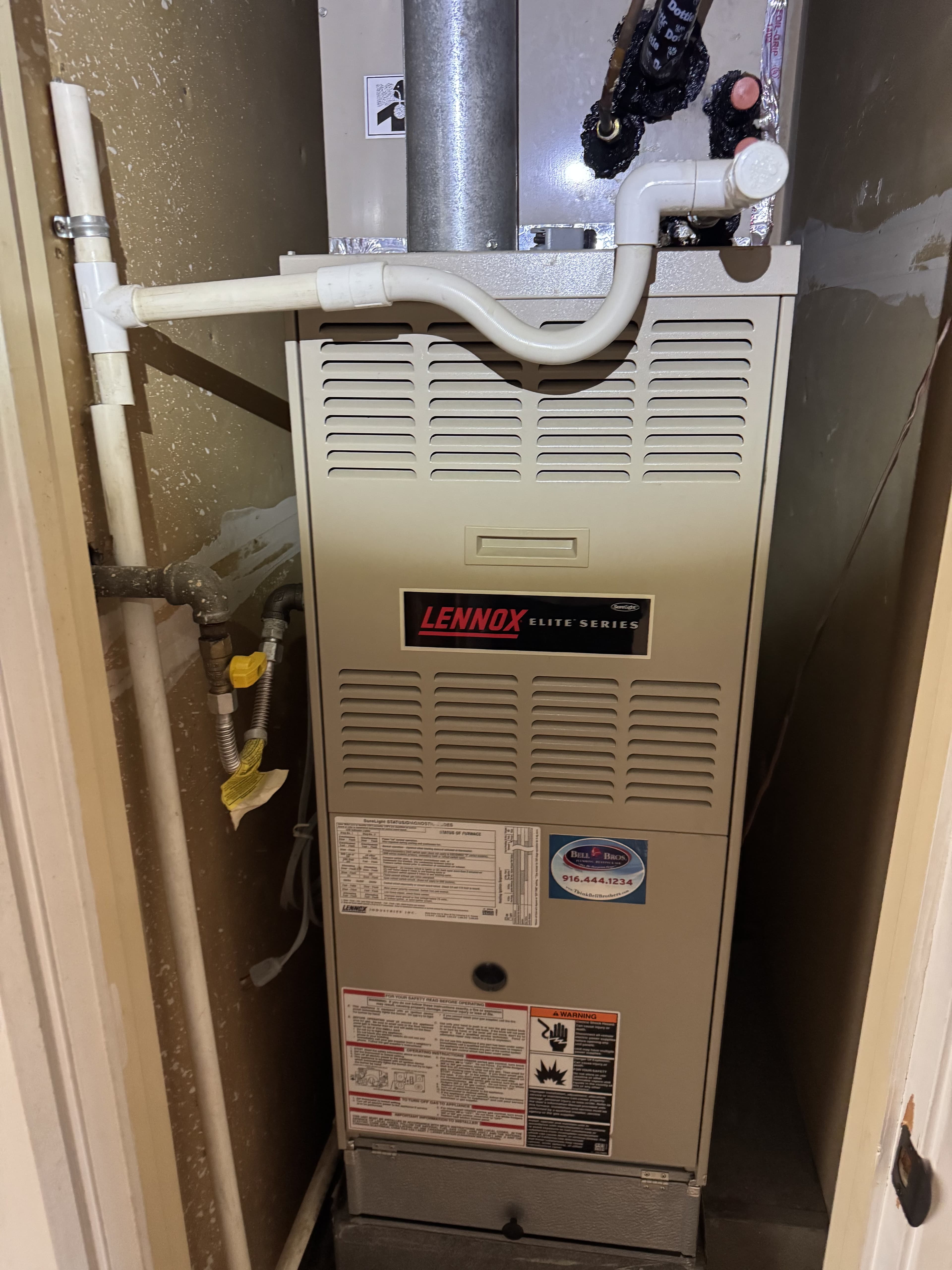 Lennox Elite Series high-efficiency gas furnace serviced by Enright