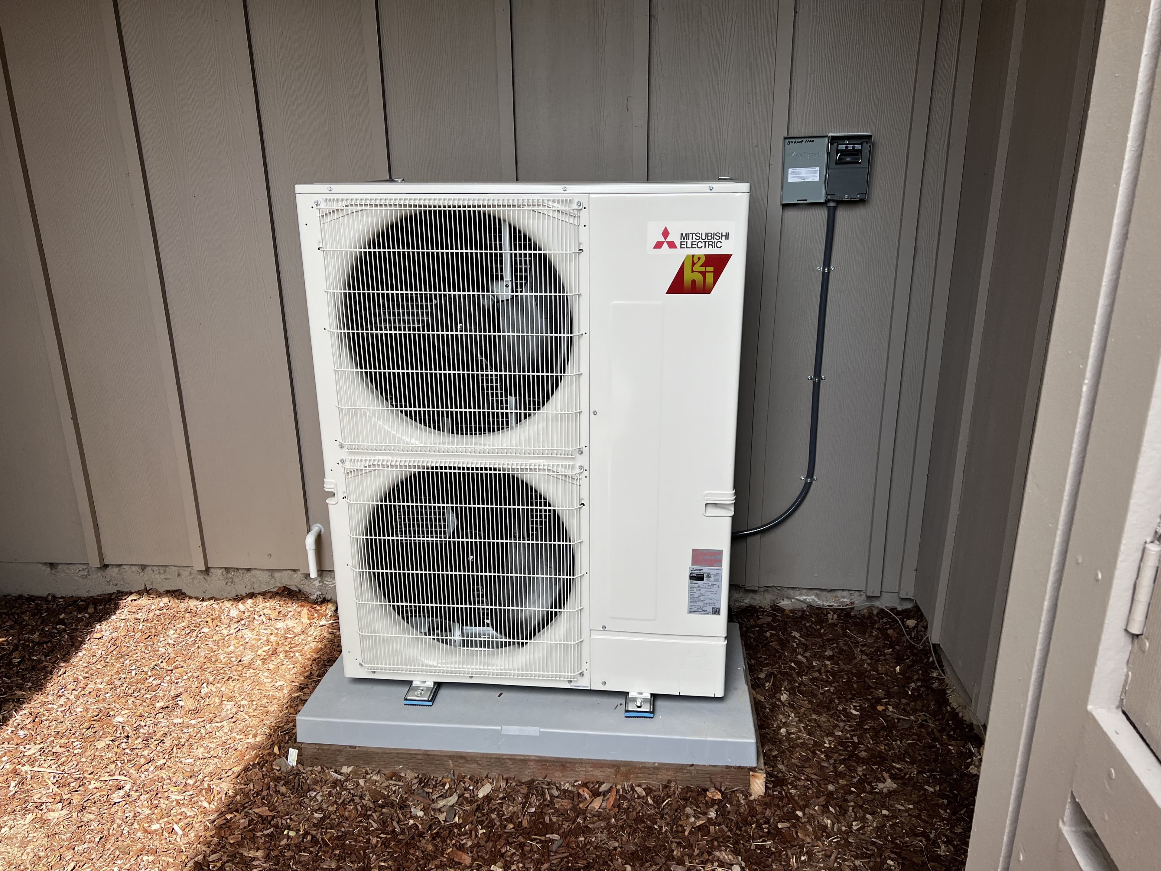 Mitsubishi multi-zone heat pump outdoor unit installation