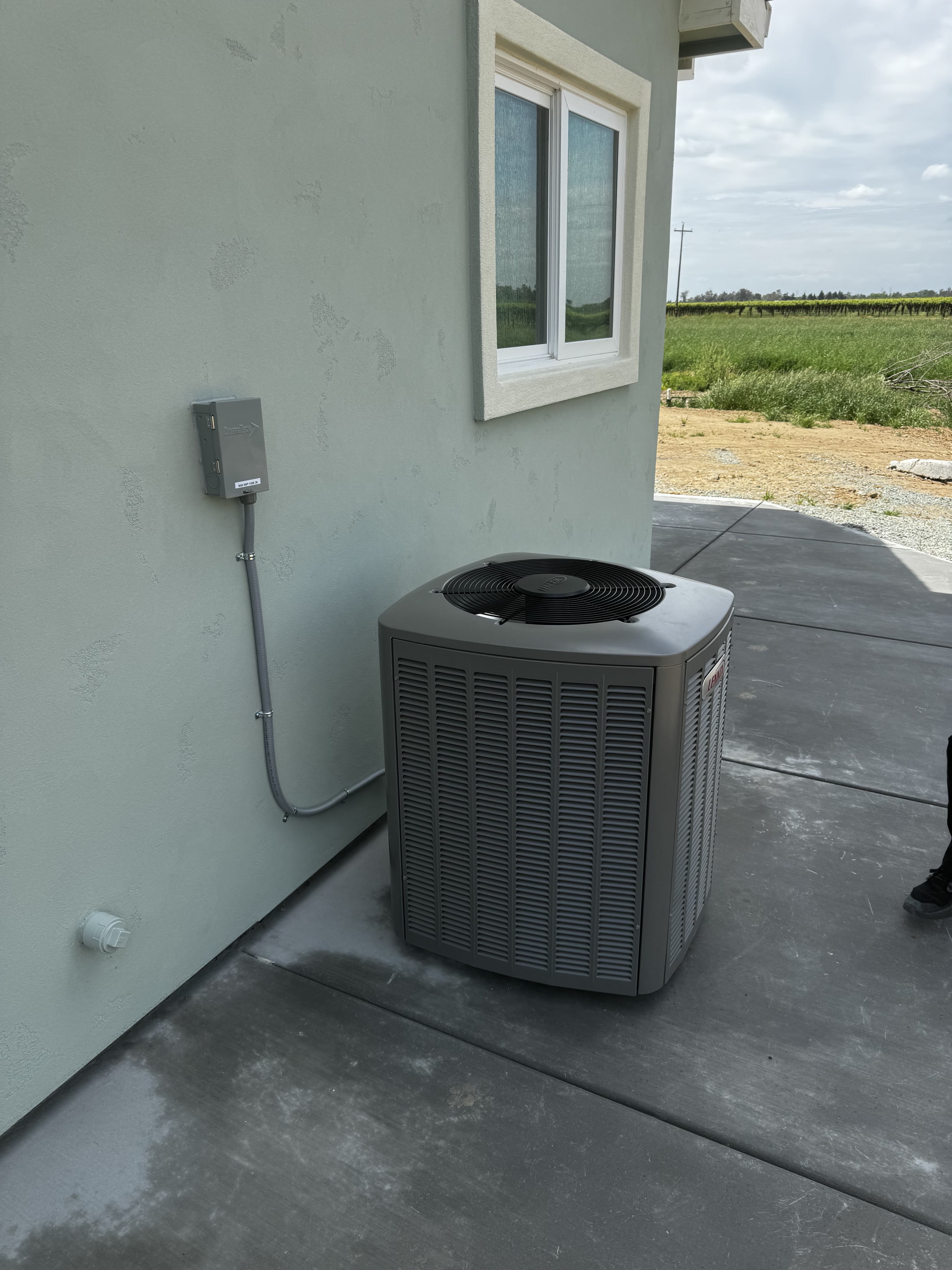New Trane AC condenser installed on a Folsom new construction home