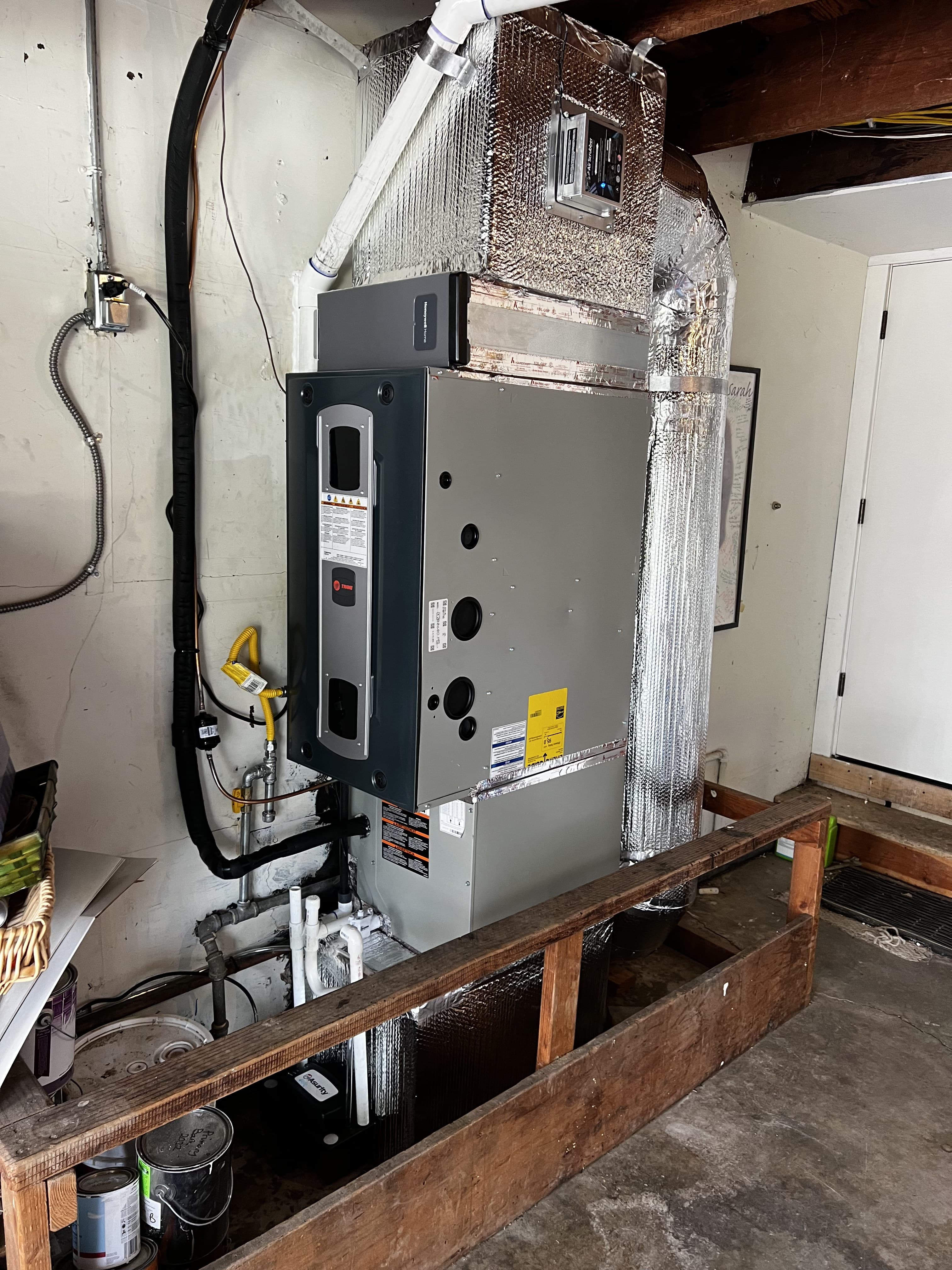 New Trane vertical furnace installed in a garage